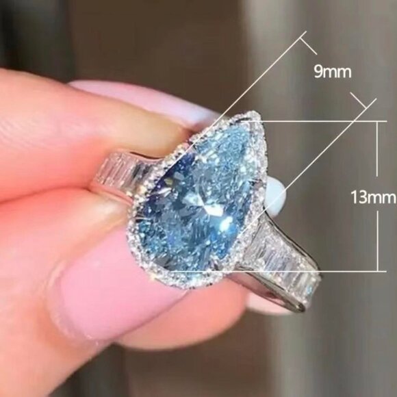 Aquamarine Zirconia Teardrop Cut Featuring Zirconia Baguettes on Sterling Silver - Picture 4 of 4